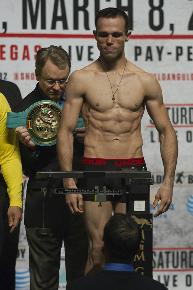 Lightweight Ricardo Alvarez of Mexico looks to the scale during his weigh-in at the MGM Grand Arena on Friday, March 07, 2014.